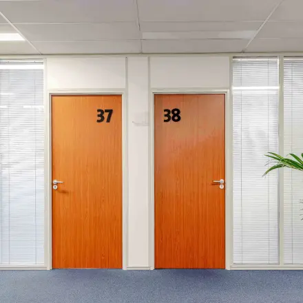 Interior hallway at Leeghwaterstraat 25, Reeuwijk, featuring two office doors with numbers 37 and 38, suitable for office space rental.