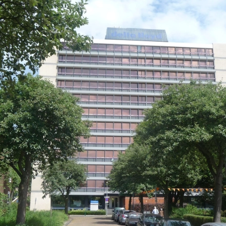 Exterior view of the office building at J.C. van Markenlaan 3 in Rijswijk, ideal for office space rental with adjacent parking.