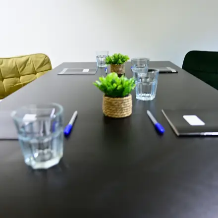 Furnished office space with a conference table and chairs, ready for meetings. Ideal choice for office space rental at Volmerlaan 7, Rijswijk.