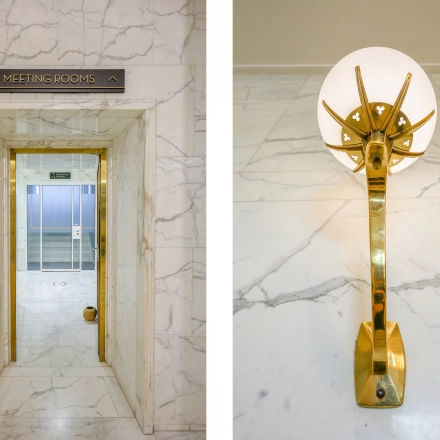 Elegant office entrance at Blaak 34, Rotterdam Center, showcasing marble walls and modern design, ideal for office space rental.