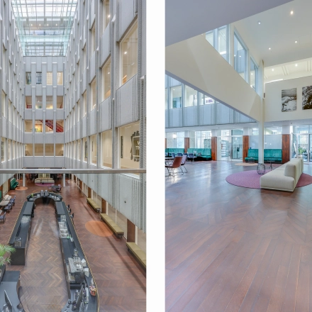 Interior view of an office space rental at Blaak 34, Rotterdam Center, showcasing a modern open floorplan with furnished areas and a glass ceiling.