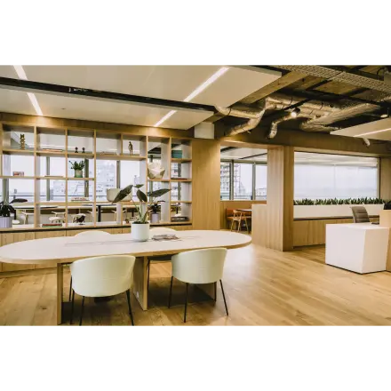 Modern furnished office space at Coolsingel 65 in Rotterdam Center, featuring a spacious open floorplan with sleek furniture and stylish decor available for rent.