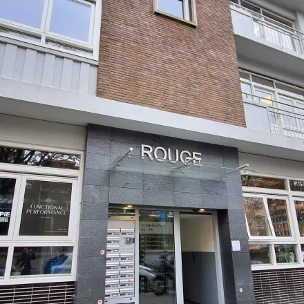 Exterior view of the office building at Wijnhaven 76, perfect for those seeking office space rental in Rotterdam Center.