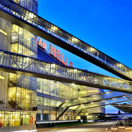 Exterior view of Van Nelleweg 1, an iconic location in Rotterdam Delfshaven, showcasing industrial architecture for office space rental.