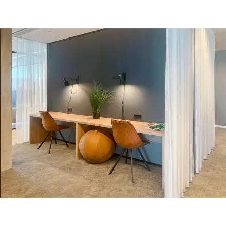 Modern furnished workspace at Wilhelminakade 173, Rotterdam Kop van Zuid, ideal for office space rental seeking functional and sleek design.