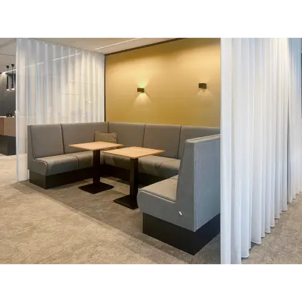 Furnished office space with cozy seating area at Wilhelminakade 173, Rotterdam Kop van Zuid, perfect for informal meetings. Ideal for those looking to rent office space with comfort.