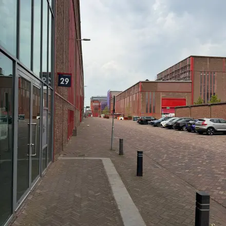 Exterior view of Scheepsbouwweg 29, Rotterdam Waalhaven, showing office buildings available for rent.