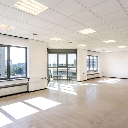 Spacious office interior at Overschieseweg 304-332, Schiedam, features large windows and ample natural light. Ideal for office space rental, offering a blank canvas for customization.