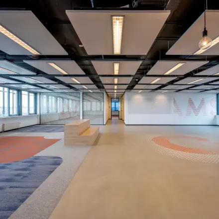 Spacious office space with modern lighting and ceiling design at Folkstoneweg 2-56, Schiphol Airport, ideal for rent office space needs.