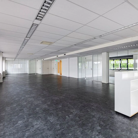 A spacious, unfurnished office interior at Atoomweg 350, Utrecht Lage Weide, perfect for rent office space. Bright and open, this office to rent offers versatility for various business activities.