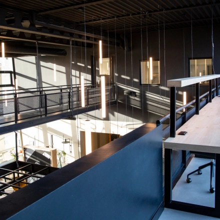 Spacious office to rent at Atoomweg 63, Utrecht Lage Weide, featuring modern workspaces with ample natural light and furnishings.