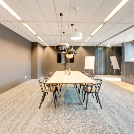 Modern conference room with a large table and chairs at Computerweg 22, ideal for office space rental in Utrecht Lage Weide.