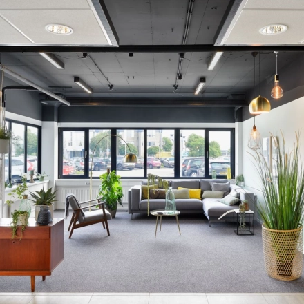 Bright office space with modern decor including plants and stylish furniture, available for rent at Reactorweg 301, Utrecht Lage Weide.