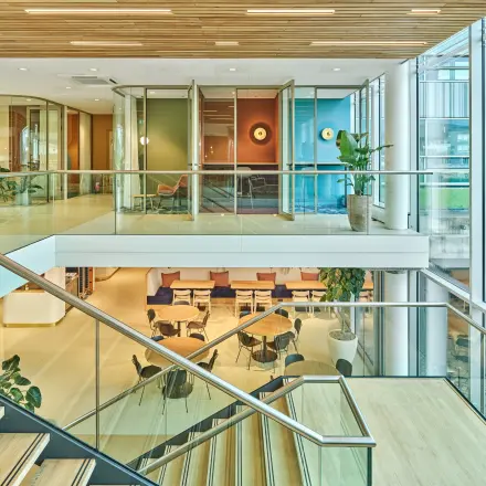 Modern office interior at Van Deventerlaan 30-40 in Utrecht Papendorp, featuring glass walls and workspaces available for rent, complementing office space rental options.