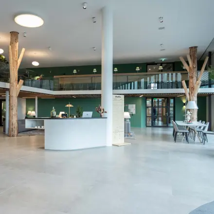 Modern office space for rent at Van Deventerlaan 31-51, Utrecht Papendorp, featuring a spacious and furnished interior with plants and seating areas, ideal for office space rental.