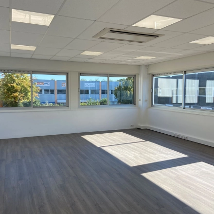 Office to rent at Zonnebaan 54, Utrecht West, featuring a bright, open space with large windows allowing natural light, suitable for various setups in this inviting office space rental.