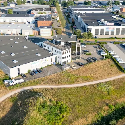 Aerial view of office buildings at Keizersveld 47, Venray, offering ample parking and office space rental.