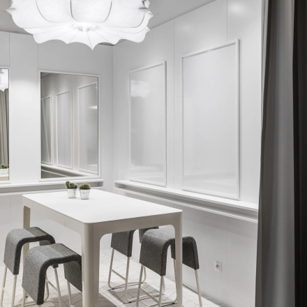 Stylish furnished office space with modern decor and seating at Konstruktorska 11, Warsaw Mokotow, available for rent office space needs.