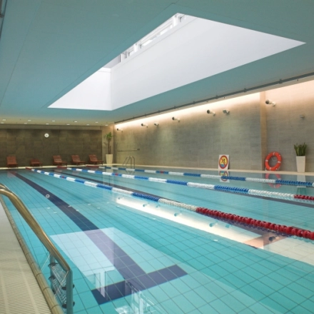 Spacious indoor swimming pool at Postępu 17A, Warsaw Mokotow, perfect for relaxation during office breaks. Consider this unique office space rental opportunity.