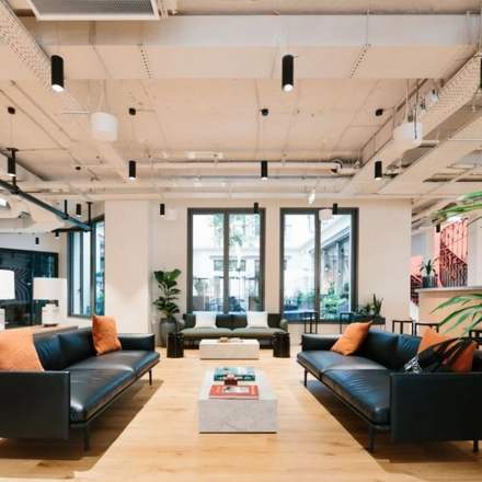 Modern furnished office space with stylish seating at Krakowskie Przedmieście 13, ideal for rent office space in Warsaw Śródmieście.