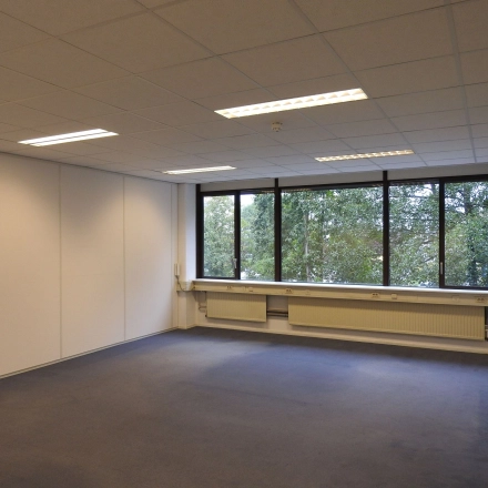 Spacious unfurnished office space with large windows at Zaagmolenlaan 4, ideal for rent office space opportunities in Woerden.