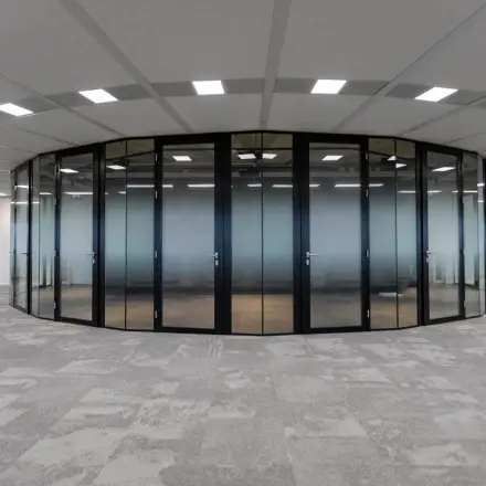 Modern office space with circular glass-walled room at Boerhaavelaan 40 in Zoetermeer, ideal for office space rental.