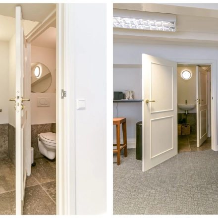 Kantoorruimte huren op Herengracht 338, Amsterdam Grachtengordel, met een functionele inrichting. De ruimte bevat een bureau en stoel, en is voorzien van een aangrenzende sanitaire faciliteit.