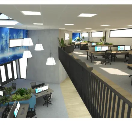 Moderne en lichte kantoorruimte te huur op Lintelerweg 40, Hengelo, met diverse werkplekken, grote ramen en veel groen accentuering.