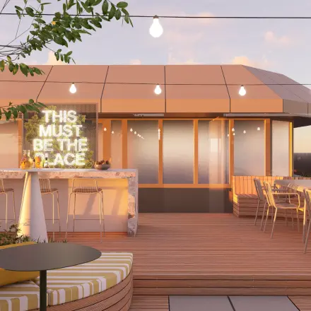 Dakterras op Marten Meesweg 101, Rotterdam Alexander met zitplaatsen en sfeerverlichting, ideale plek na kantooruren of pauzes tijdens de huur van kantoorruimte.