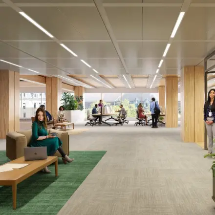 Ruime, moderne kantoorruimte op Coolsingel 75 in Rotterdam Centrum met gemeubileerde werkplekken en personen die zakelijke activiteiten uitvoeren.