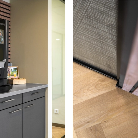 Detail van een moderne kantoorruimte huren in Zwijndrecht, met strakke houten vloer en een stijlvolle kast met koffiezetapparaat. De ruimte toont een professionele sfeer voor zakelijke doeleinden.