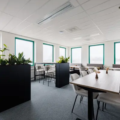 Spacious, well-lit office space at Stadsring 201, Amersfoort Centrum, available for rent with modern furniture and large windows.