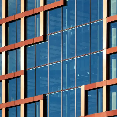 Exterior view of the modern office building at H.J.E. Wenckebachweg 230-258 in Amsterdam Amstel Business Park featuring a contemporary glass facade. Ideal for office space rental with easy access and natural lighting.