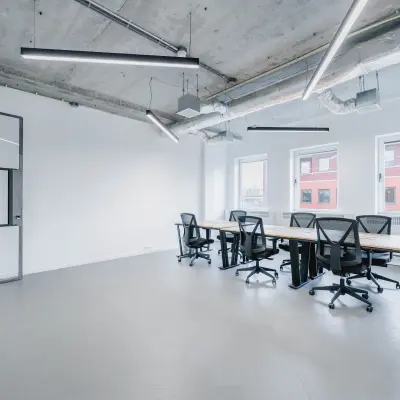 Bright office space at H.J.E. Wenckebachweg 90-108 in Amsterdam Amstel Business Park, featuring a modern open floor plan with desks and chairs, perfect for office space rental.