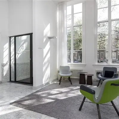 Bright office space with modern furnishings at Keizersgracht 62-64, Amsterdam Canal Belt, perfect for rent office space with natural light.