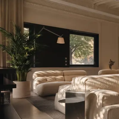 Spacious, stylish office lounge at Weteringschans 126 in Amsterdam Center, ideal for office space rental with cozy seating and natural light.
