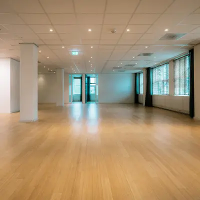 Spacious office to rent at Overschiestraat 182, Amsterdam De Schinkel with wooden flooring and ample natural light.
