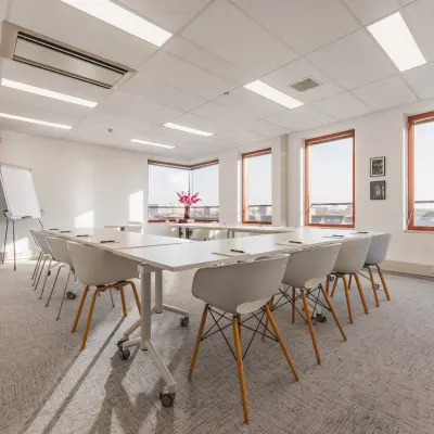 Spacious conference room at Daalwijkdreef 47, Amsterdam Duivendrecht, available for office space rental with modern furnishings and large windows.