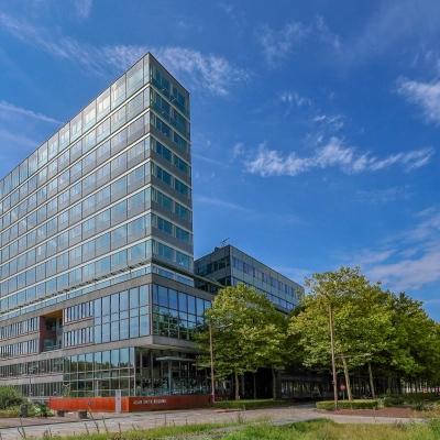 Exterior view of office building at Thomas R. Malthusstraat 1-3, Amsterdam Riekerpolder, ideal for those looking to rent office space.