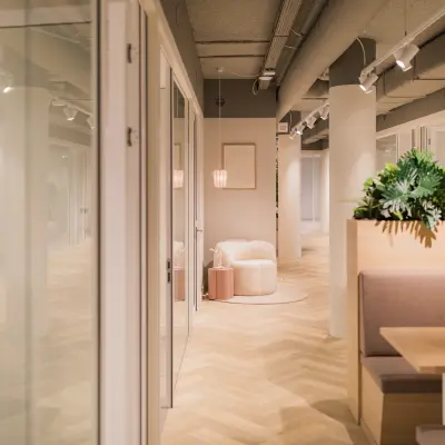 Modern, furnished office space rental at Hullenbergweg 109-135, Amsterdam South East, featuring stylish seating areas and contemporary decor.