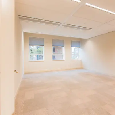 Empty office space with large windows at Hullenbergweg 109-135, suitable for office space rental in Amsterdam South East.