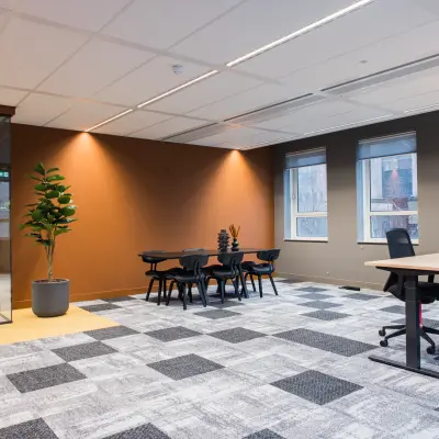 Contemporary office space at Hullenbergweg 109-135 in Amsterdam South East with large windows and modern furnishings, ideal for office space rental.