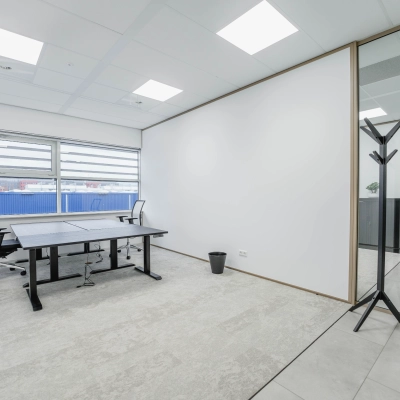 Bright office space interior with desks and chairs, perfect for those seeking office space rental in Amsterdam South East.