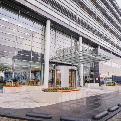 Modern exterior of the office building at Laarderhoogtweg 7-19 in Amsterdam South East, showcasing ample glass and sleek lines—a potential hub for your next office space rental.