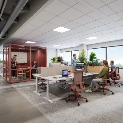 Modern office space rental at Luttenbergweg 8 in Amsterdam South East featuring seated individuals working at desks and collaborating in a glass-walled conference area.