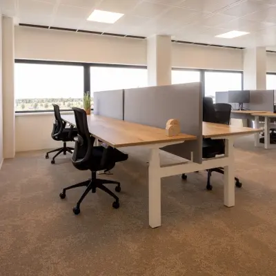 Spacious office to rent at Luttenbergweg 8, Amsterdam South East, featuring modern workstations and ample natural light, ideal for office space rental.