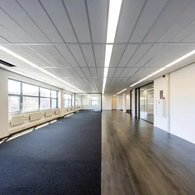 Spacious office space for rent at Paasheuvelweg 20 20, Amsterdam South East, featuring large windows and ample natural light.