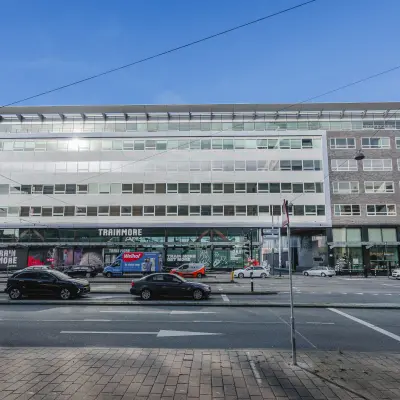 Exterior view of an office building at Bos en Lommerplein 280, Amsterdam West, ideal for office space rental.