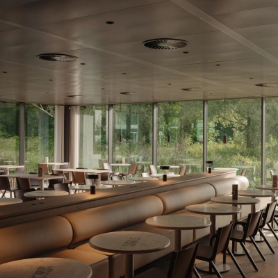Spacious office interior with large windows at Nachtwachtlaan 20, Amsterdam West, suitable for office space rental.