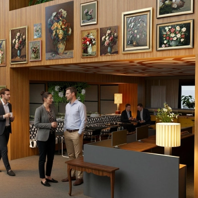 Modern office space in Amsterdam Zuidas, featuring stylish decor and people engaged in discussions, perfect for office space rental needs.